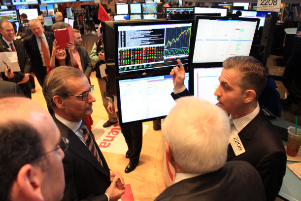 The team talking with Market Maker