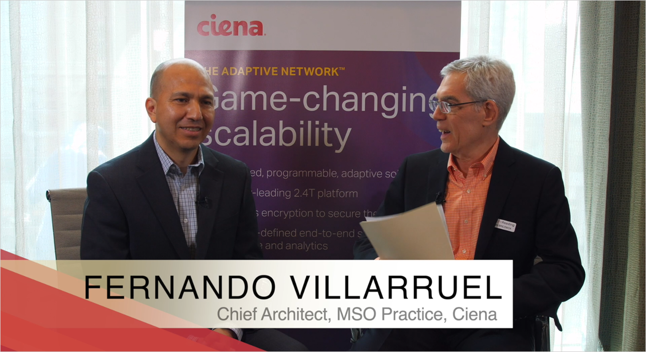 Ciena's Fernando Villarruel talking to Alan Breznick