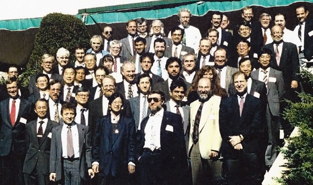 A picture from the DARPA WDM Network Workshop at MIT Endicott House in 1993. Included in the picture is Steve Alexander (top row, center, in the white shirt) and Joe Berthold (bottom row, second from the right in the yellow suit)