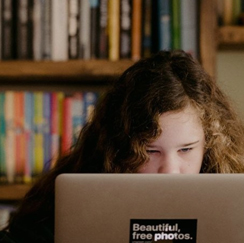 Female student working on laptop