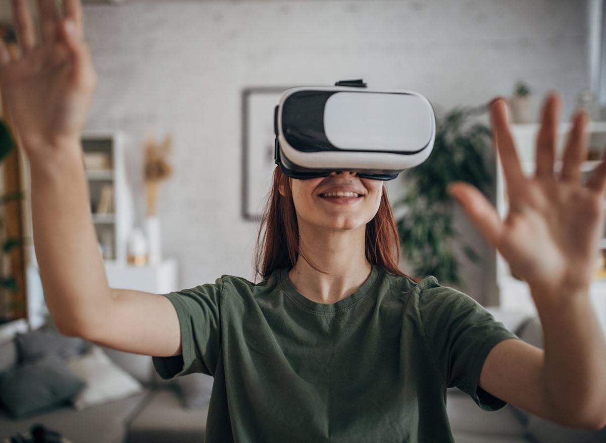 Woman having fun with VR headset