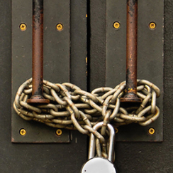 Chained door with padlock