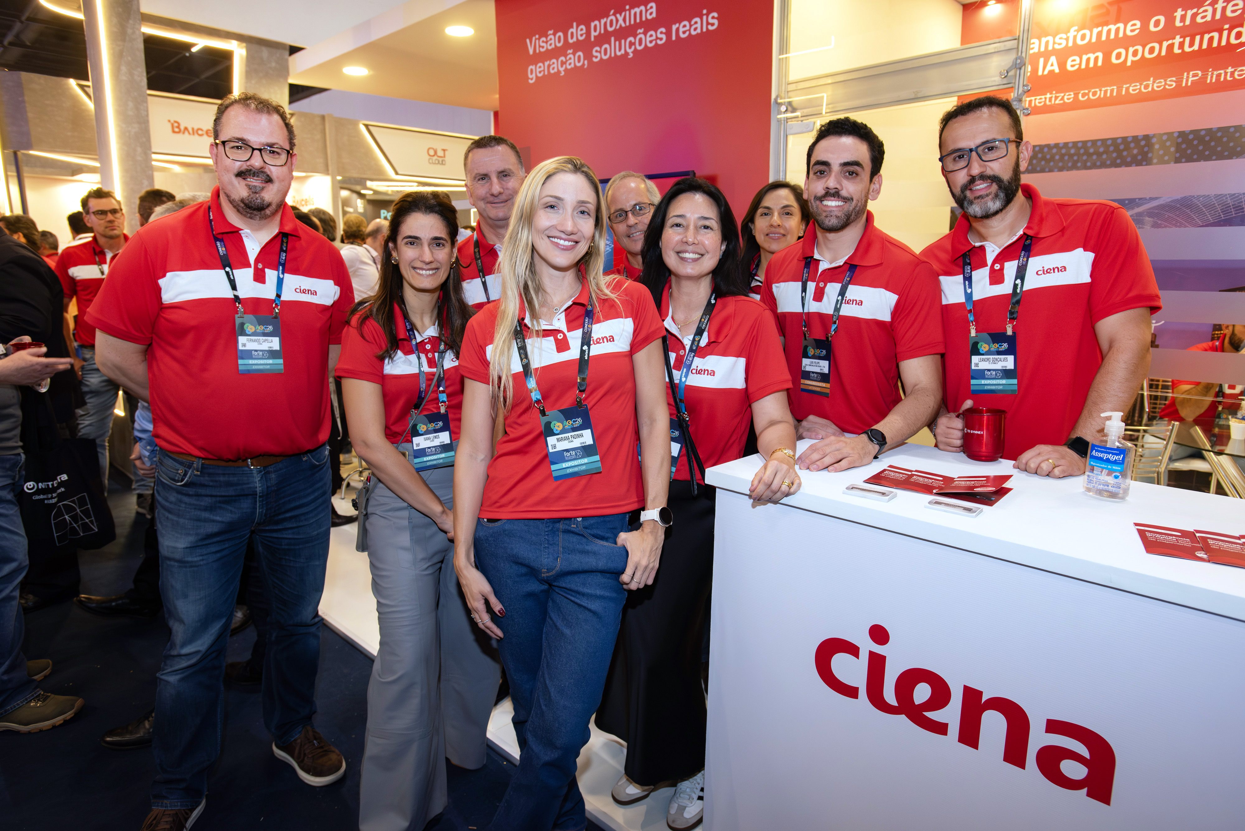 Ciena branding prominently displayed on the reception counter and staff apparel.