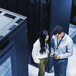 Man and woman in server room