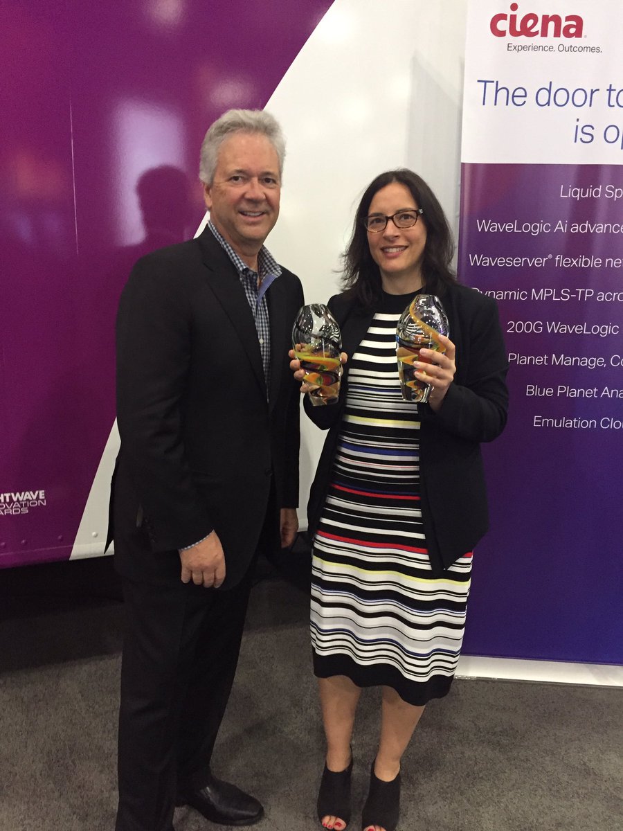 Ciena's Helen Xenos accepts two Lightwave Innovation Awards from Rob Stuehrk at Lightwave