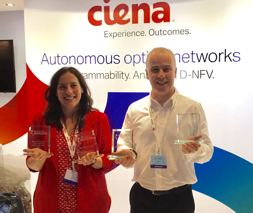 Ciena's Helen Xenos and Mirko Voltolini from Colt show off the four combined awardds the two companies took home from NGON 2017.