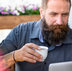 Bearded man in cafe