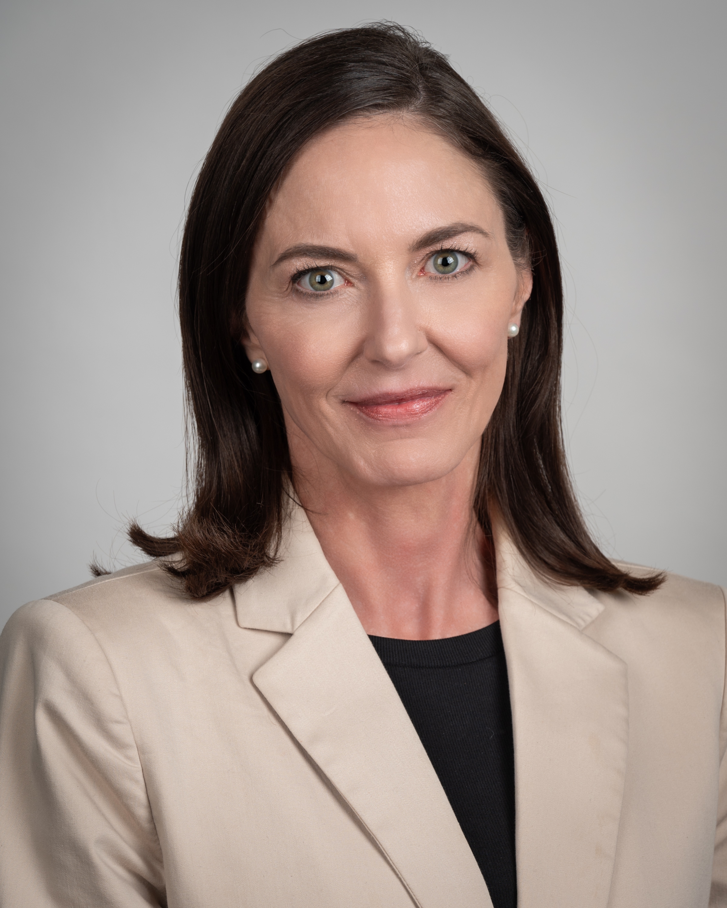 A professional headshot of Julie 