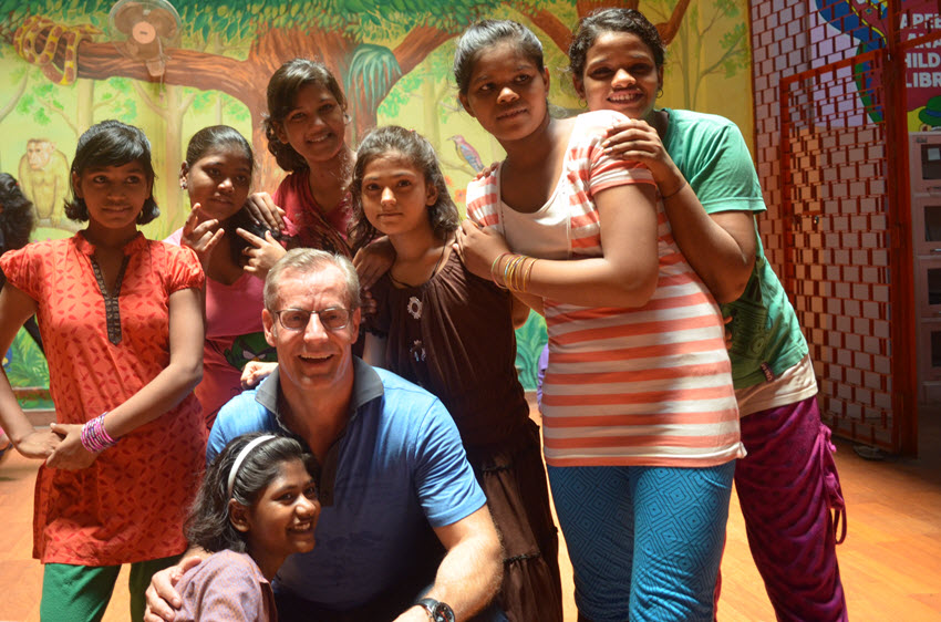 Ciena CEO Gary Smith with a group of children at the Salaam Baalak Trust children’s shelter
