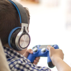 Young boy playing video games