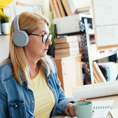 Woman wearing headphones on conference call