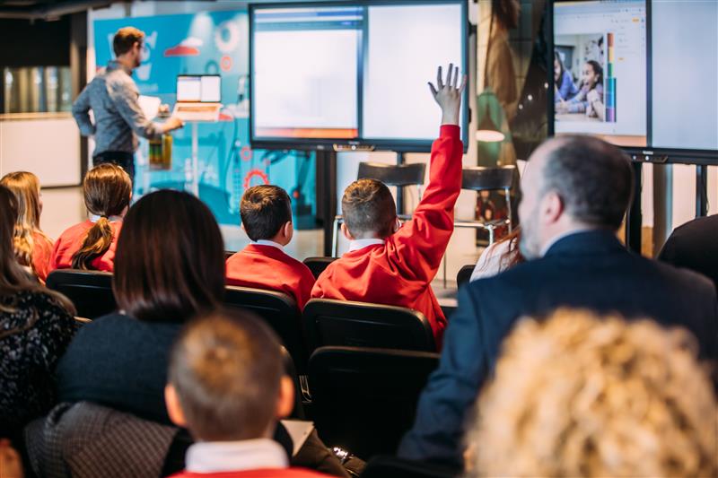 A student raises their hand