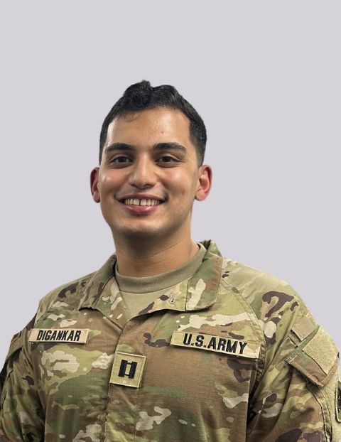 Fahad in uniform on a grey background