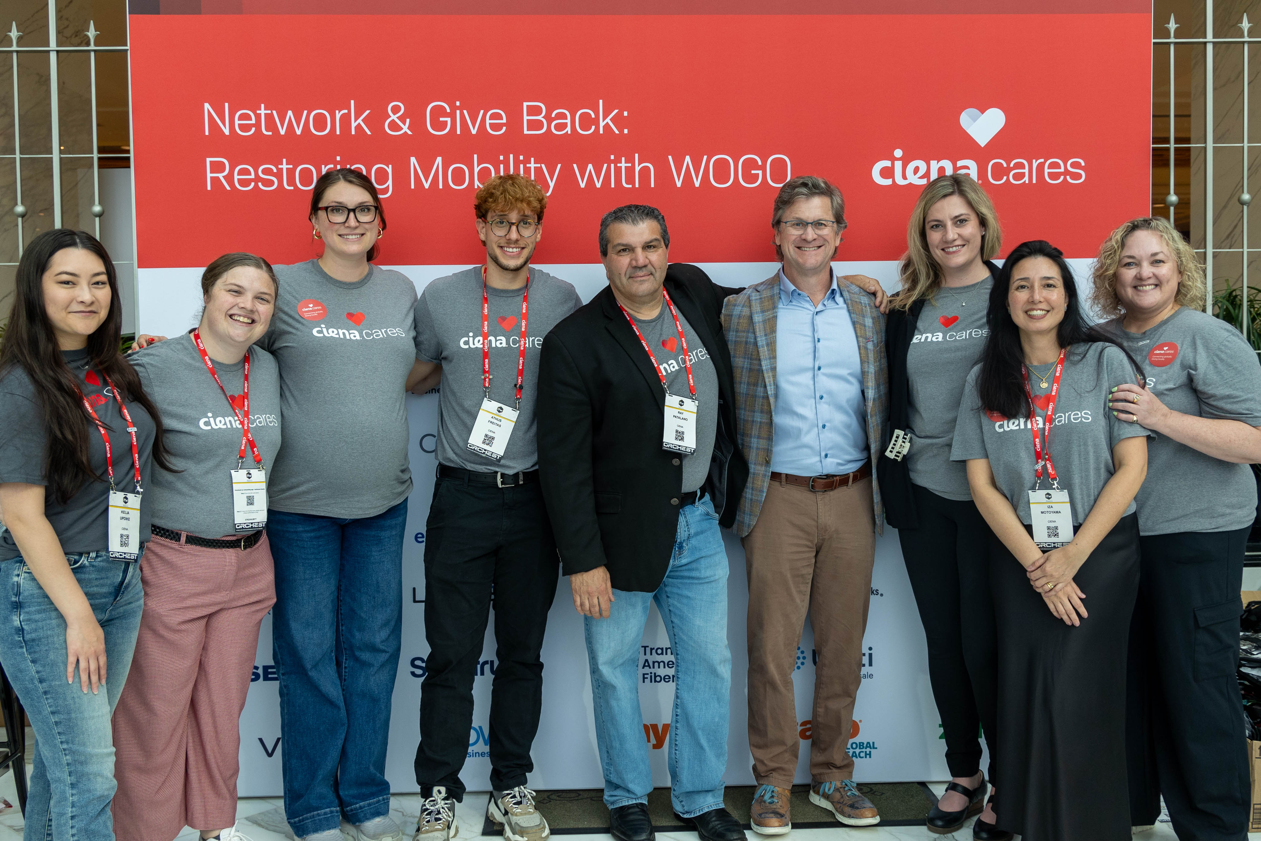 Group photo of volunteers and participants at the Ciena Cares mobility restoration initiative.
