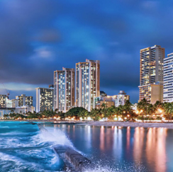 Cityscape at night, view from the ocean