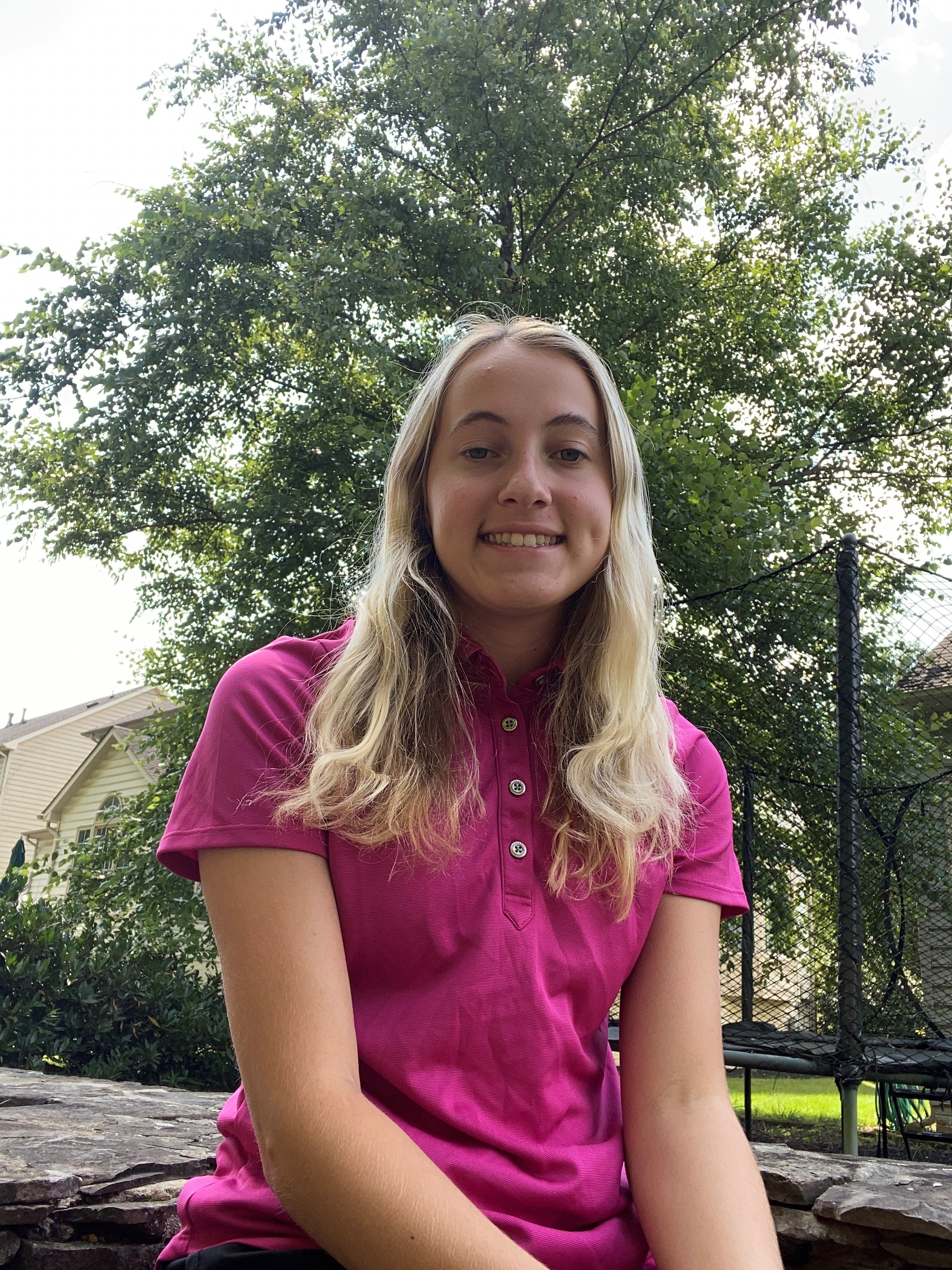 Girl sitting smiling 