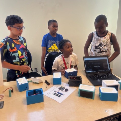 Students participating in a robotics competition 