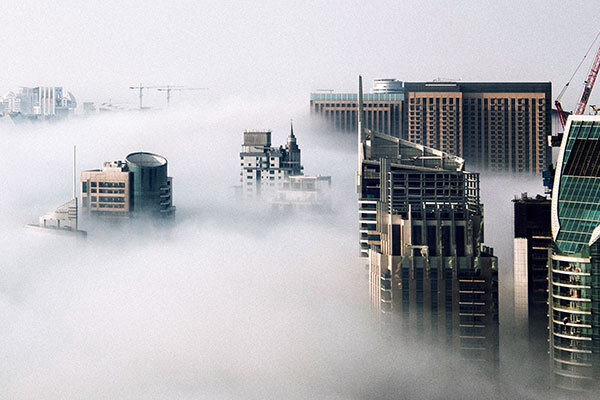 A city landsape covered with fog