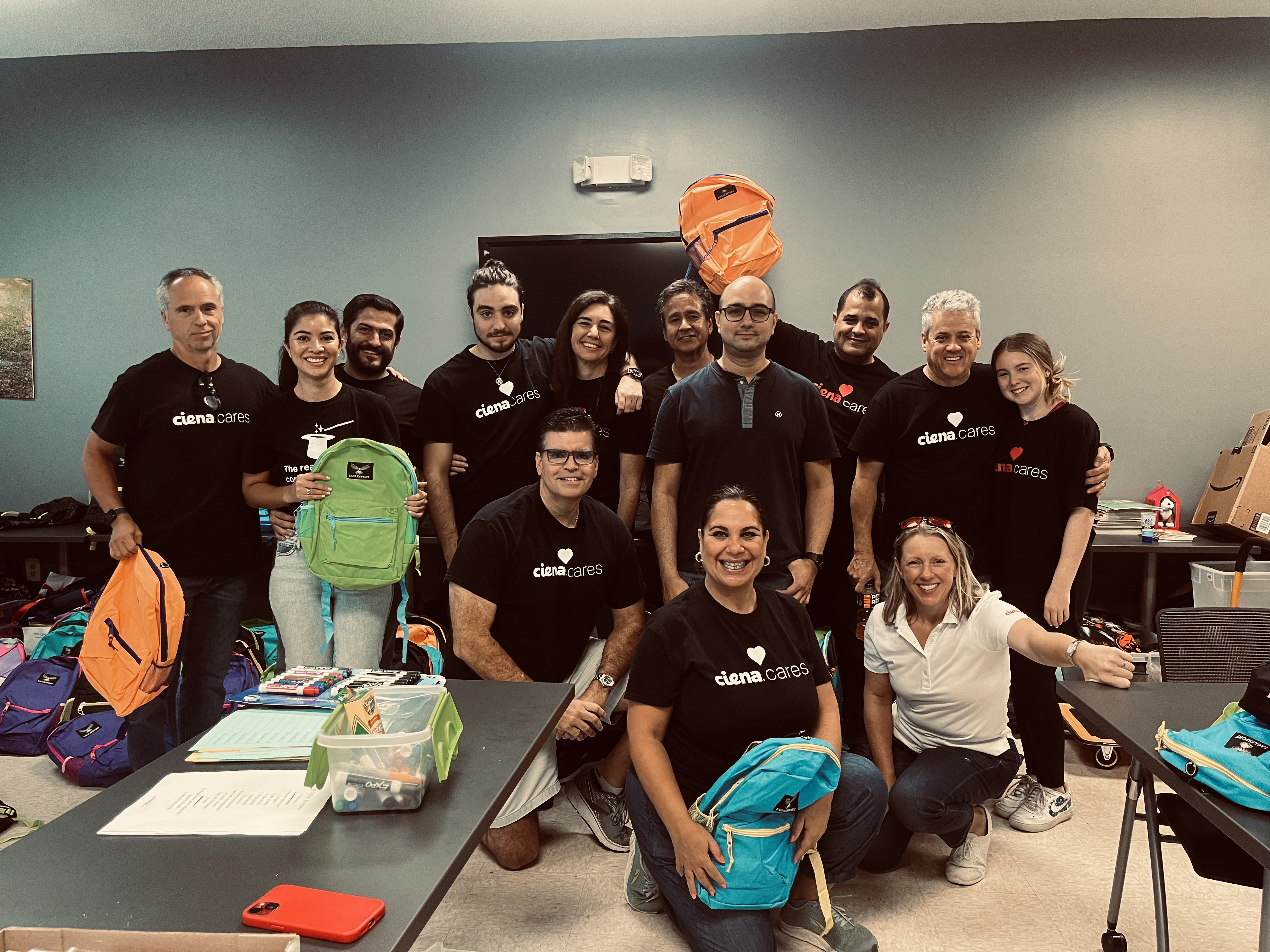 Ciena volunteers packing backpacks