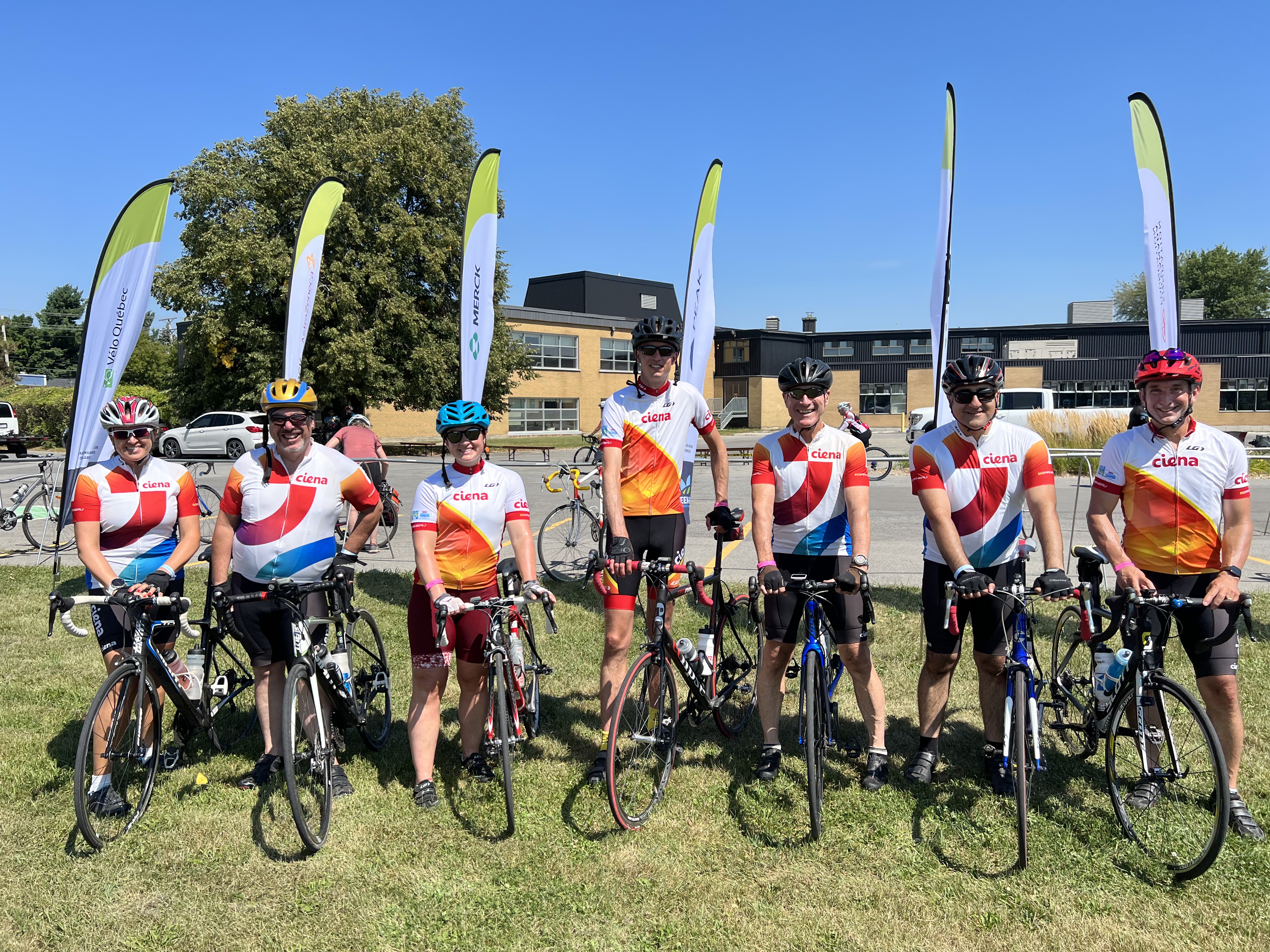 Ciena employees riding bicycles