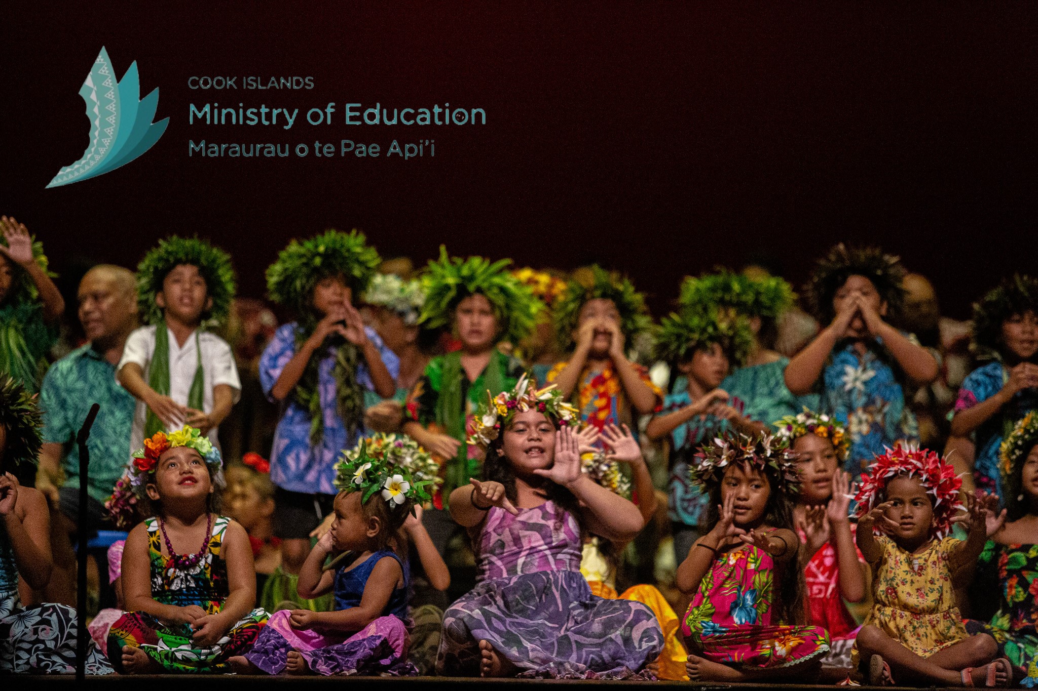 Children performing on a stage 