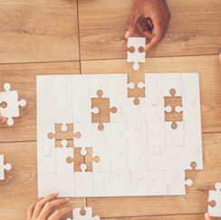 Friends putting together a puzzle